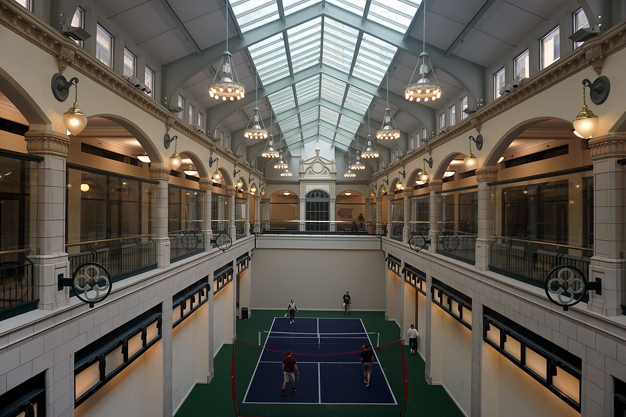 Pickleball inside the Plankinton Arcade in Milwaukee, Wisconsin, photographed in November 2022.. Reference photograph — not the named local club or event..